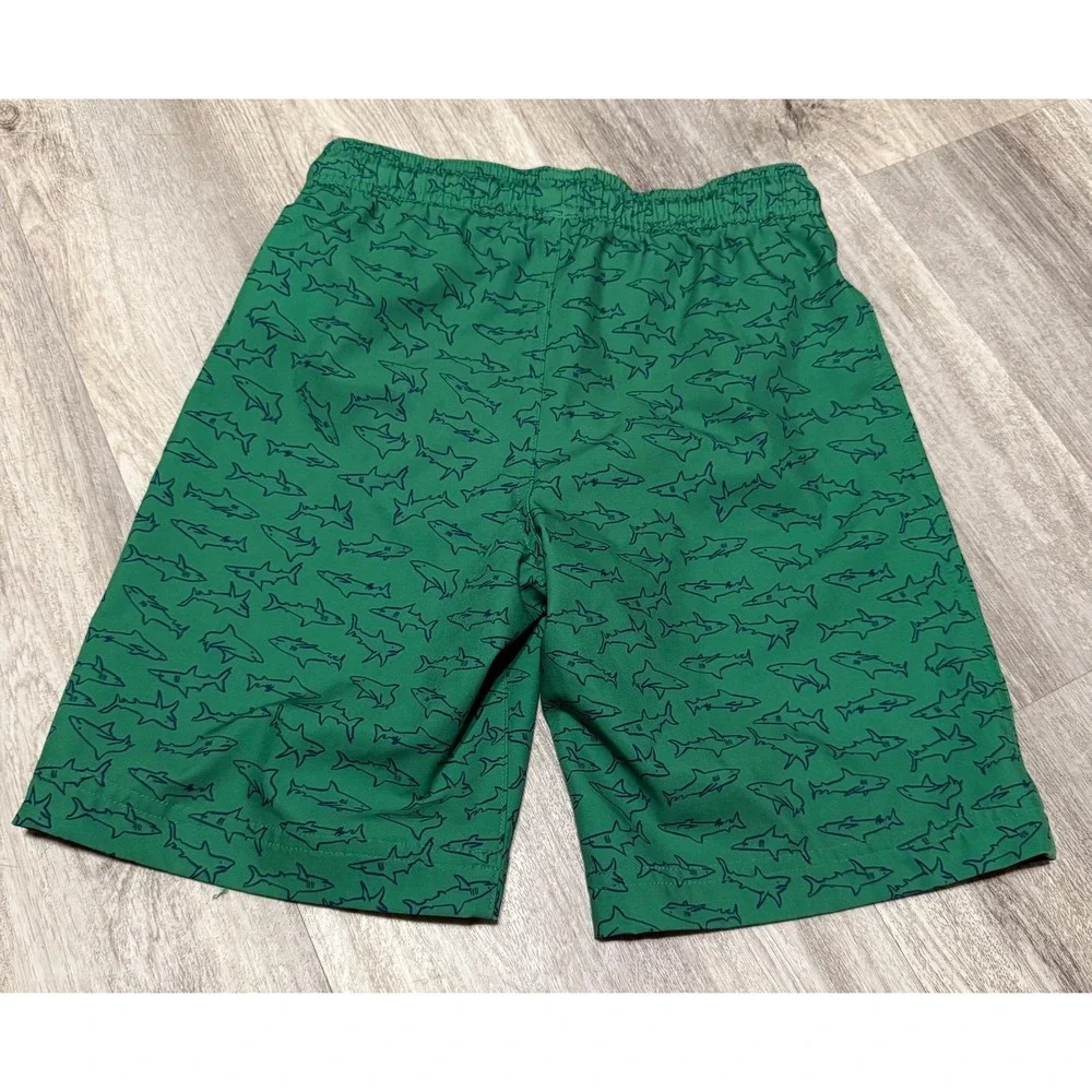 Amazon‎ Essentials size small boys green shark swim trunks 6/7